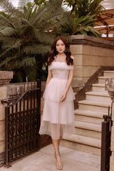 Tiered pleated midi organza dress with sheer neckline and layered skirt detailing